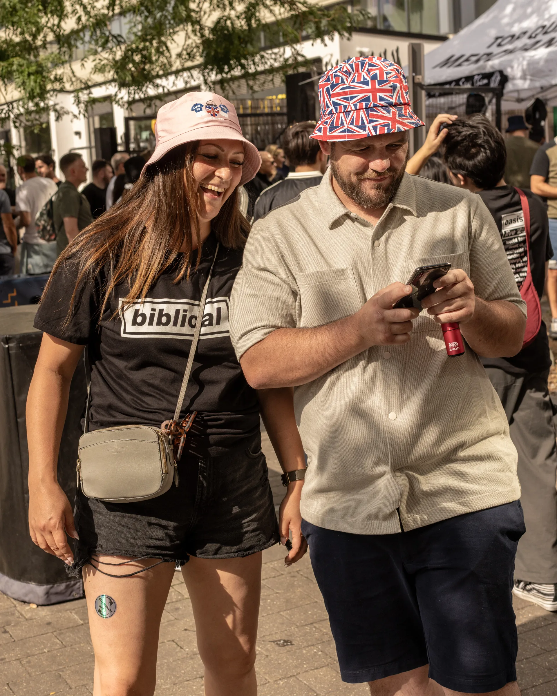 Oasis fans at Wembley Stadium in London for the reunion shows, by Chris Bethell