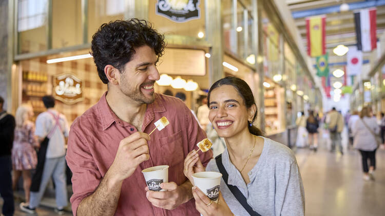 Couple eating street food