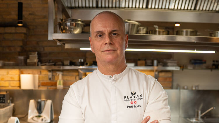 Chef István Pesti in the kitchen of Platán Gourmet Étterem, bringing traditional Hungarian flavours to Time Out Market Budapest with his exclusive new concept, CANTEEN.