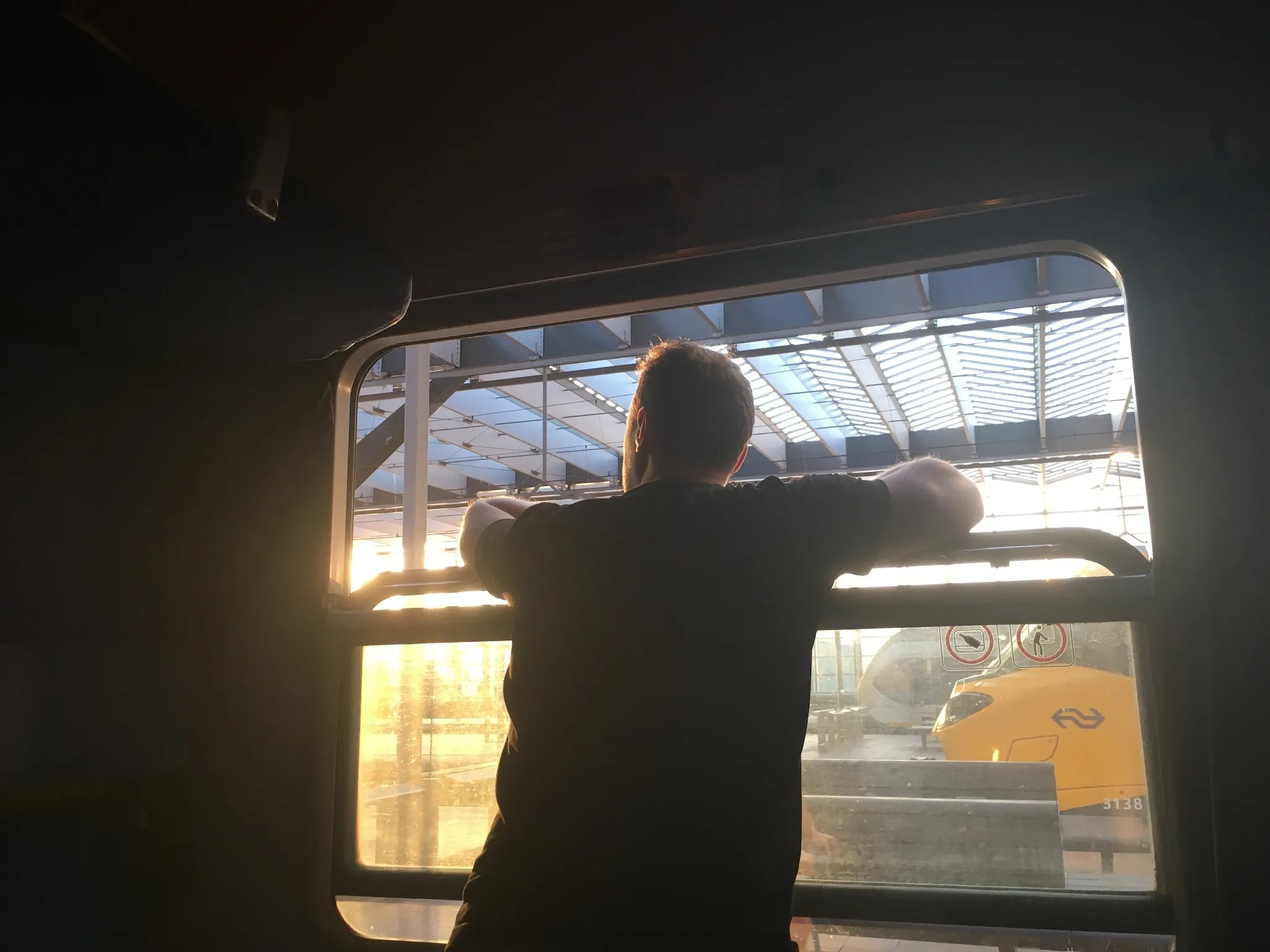 Leaning out the window in Rotterdam on the European Sleeper
