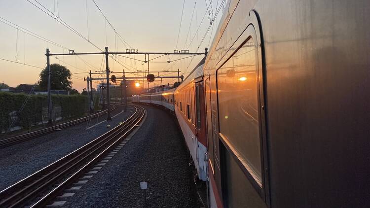 A view of the European Sleeper train as the sun is setting
