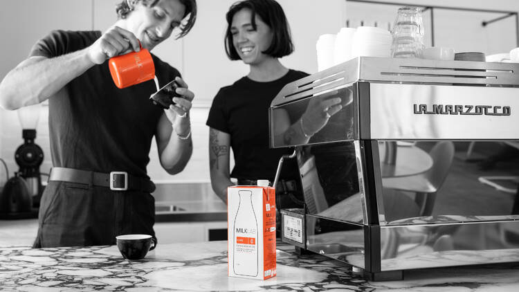 People making a coffee with Milklab milk