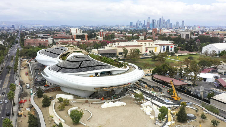 The in-construction Lucas Museum with the Downtown skyline in the background.