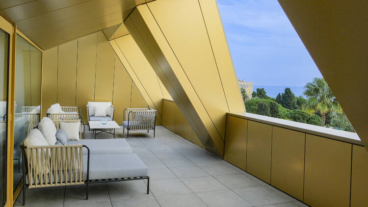 Victoria Suite at Maison Ablar in Nice, France, showing a yellow terrace looking out over Nice