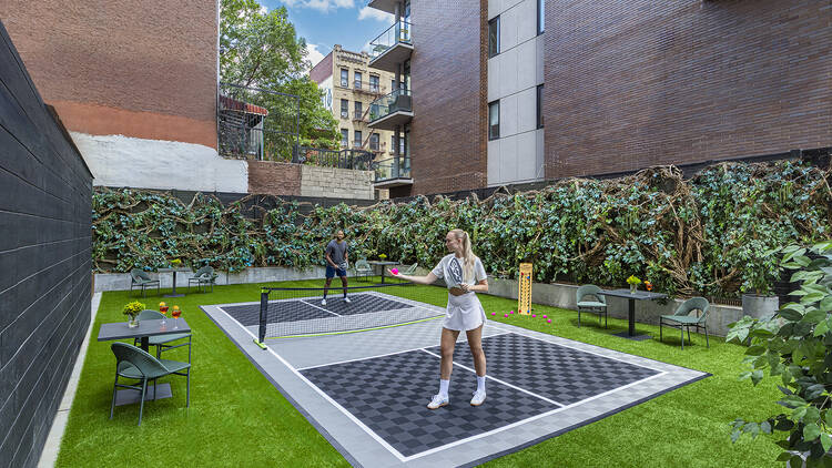 Moxy Williamsburg pickleball court opening with people
