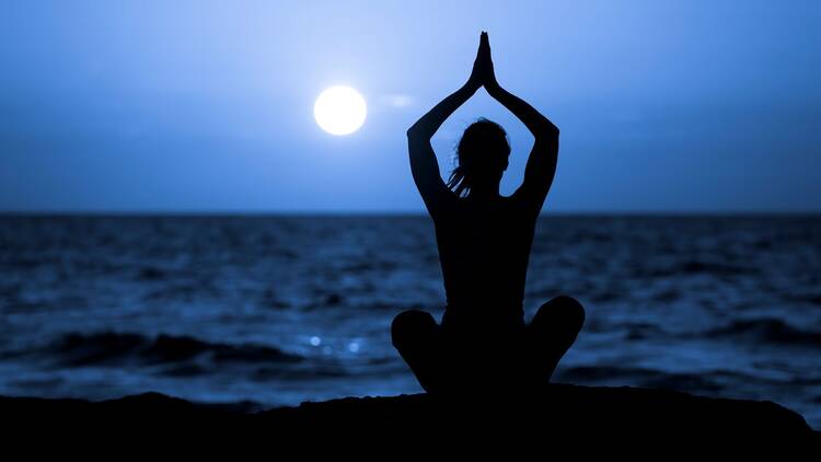 Practise yoga on a full moon night