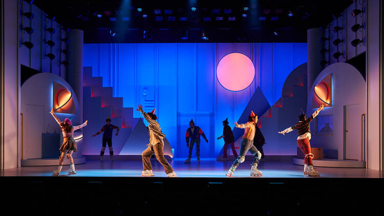 Cast members roller skating on stage in 'Kimberly Akimbo'.