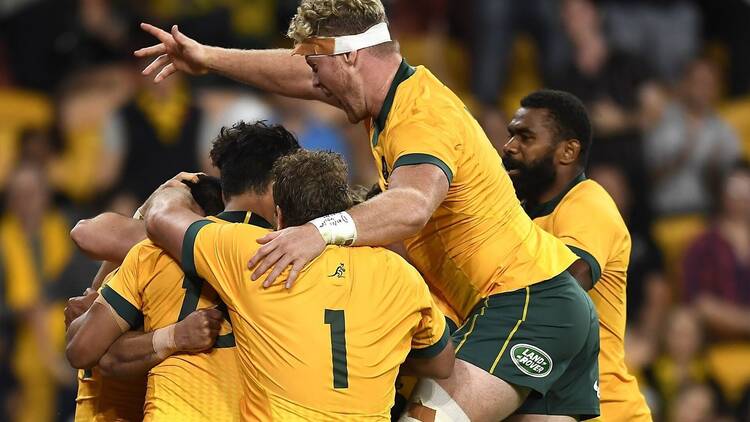 Wallabies rugby players in scrum