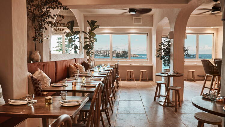 Interior of Greek restaurant Ikaria with views of Bondi Beach
