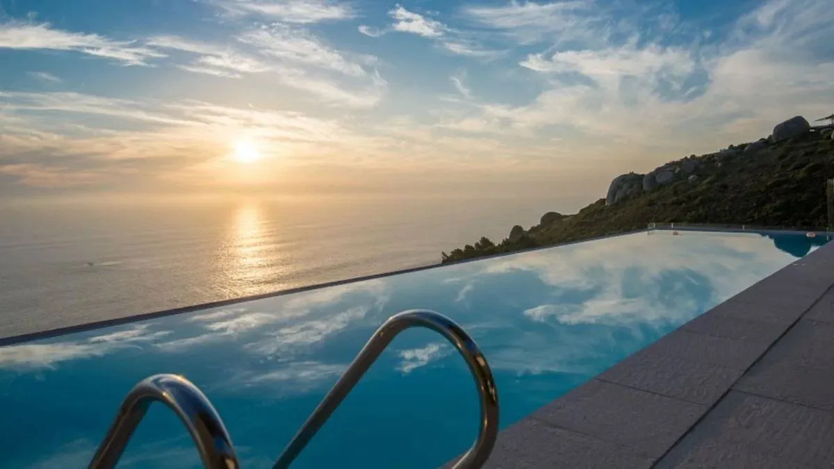 A 16-metre heated infinity pool spills out toward the Atlantic Ocean
