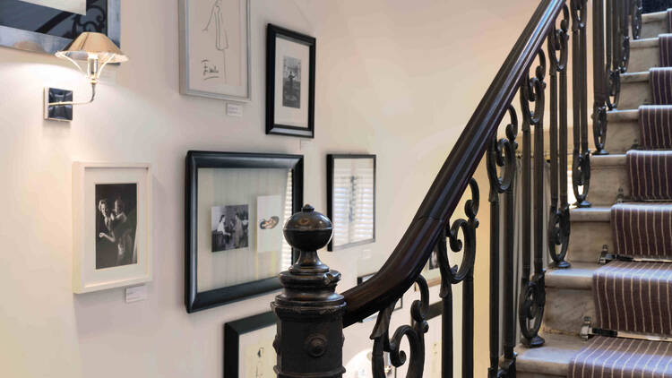 Portrait Roma staircase with old photos
