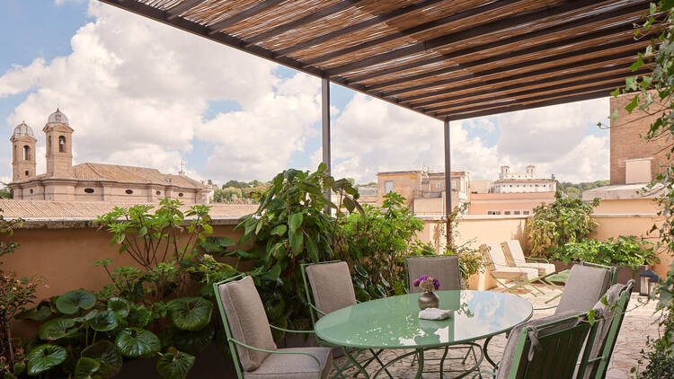 Bulgari Roma outdoor seating with old Roman buildings in the background