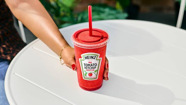 A red smoothie with a Heinz label on it