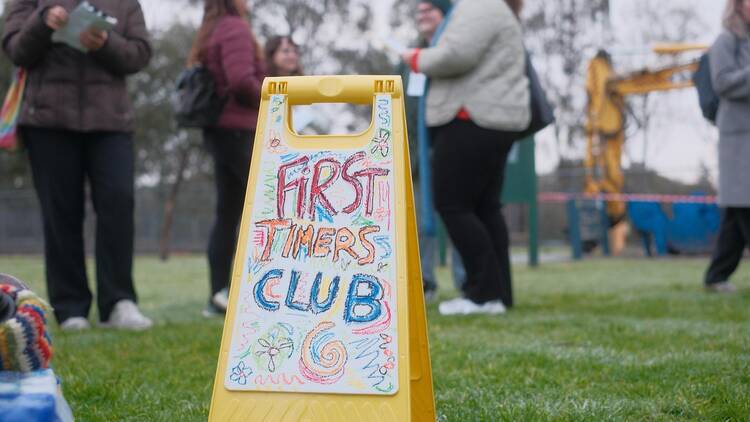 A sign that says 'First Timers Club'.