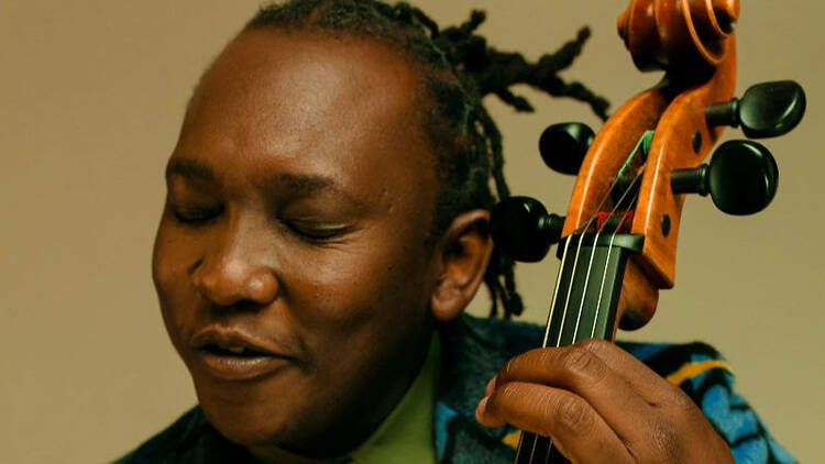 Abel Selaocoe with a cello
