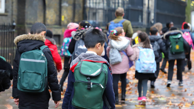 Schoolkids with backpacks