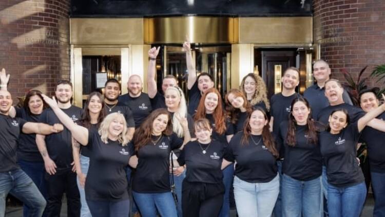 a group of people smiling