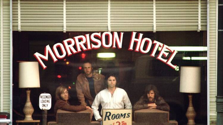 Jim Morrison and others looking out a hotel window Jim Morrison and others looking out a hotel window