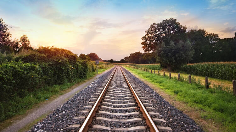 Railroad tracks through a rural setting