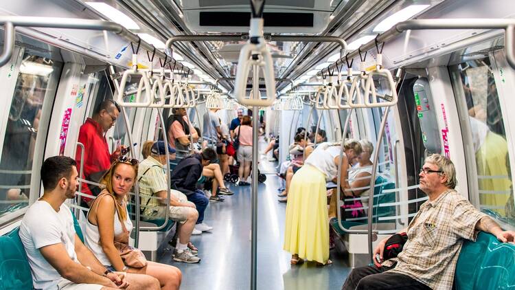 MARINA BAY, SINGAPORE - NOV 3, 2018: Interior of Singapore MRT Circle line C830 trains with moderate number of passengers