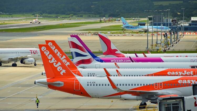 Airplanes on the runway at Gatwick Airport, London