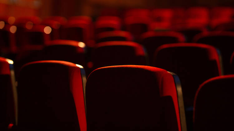 iStock photo of red armchairs in cinema