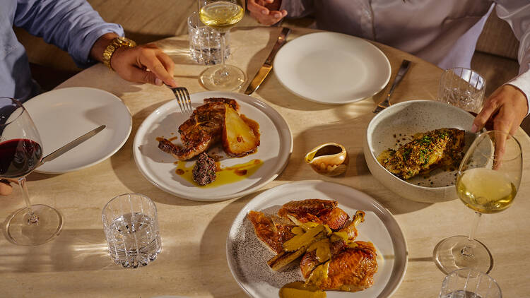 A table of food at From Here By Mike at 1 Hotel Melbourne.