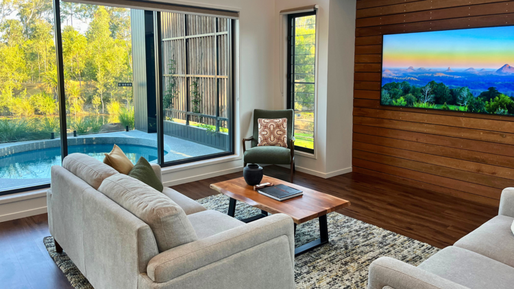 Lounge room with Tv and couches