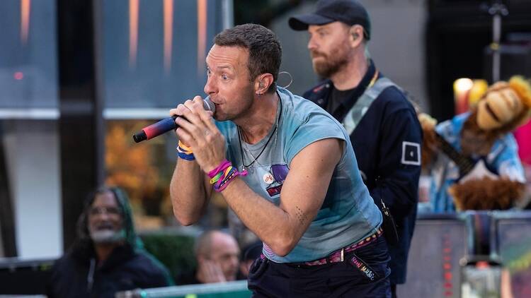 Chris Martin of Coldplay performing live