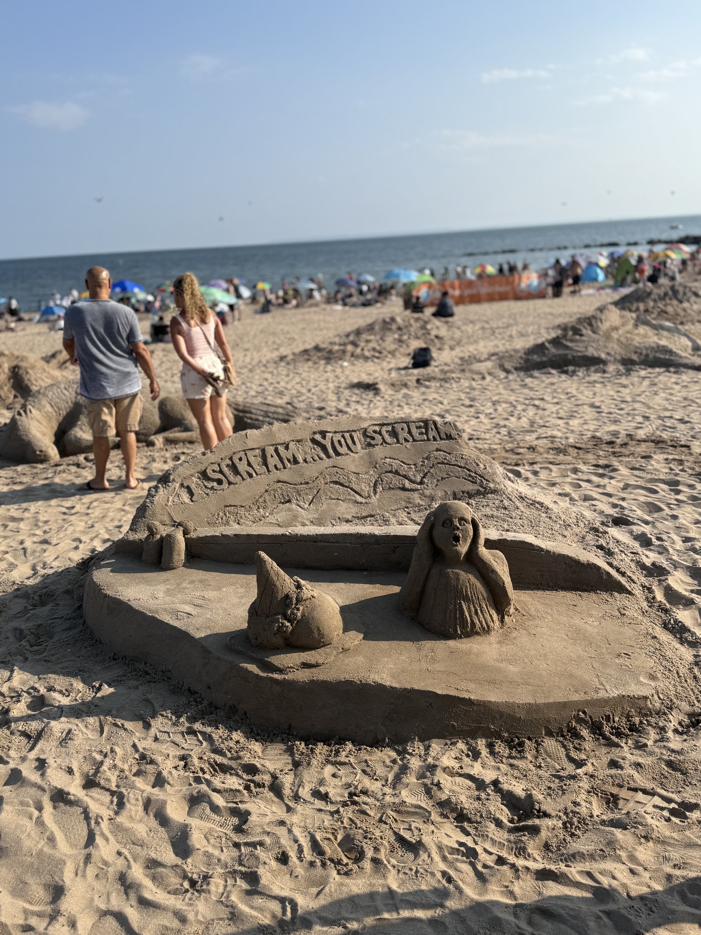 A sand sculpture of an ice cream cone.