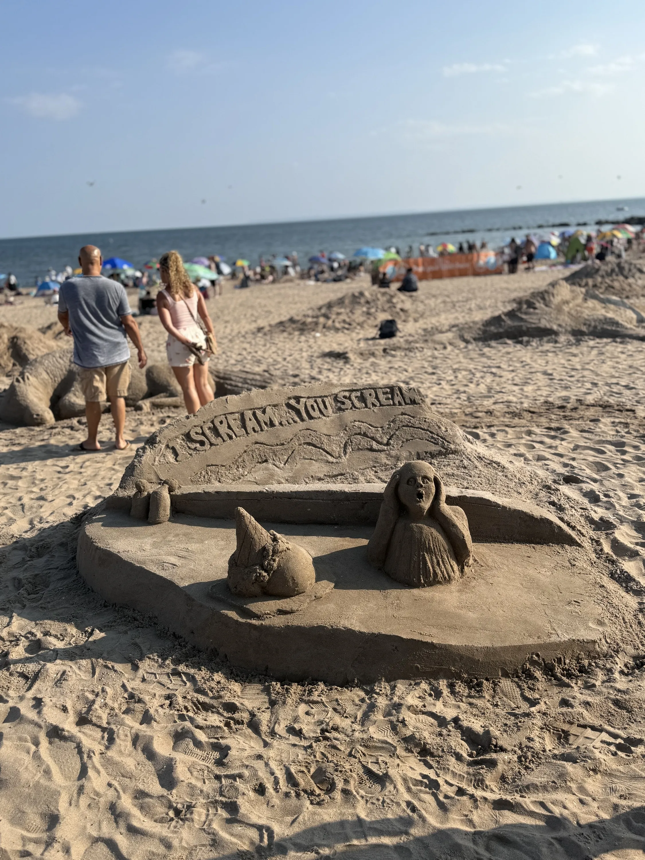 A sand sculpture of an ice cream cone.