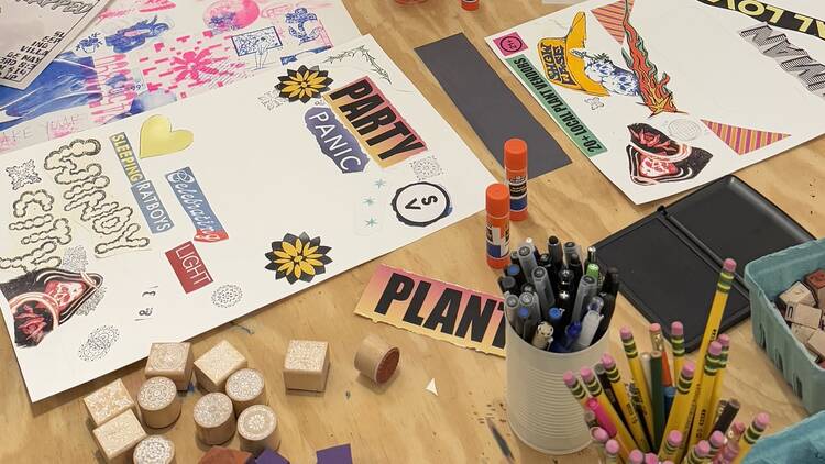 A picture of a table strewn with crafting supplies.