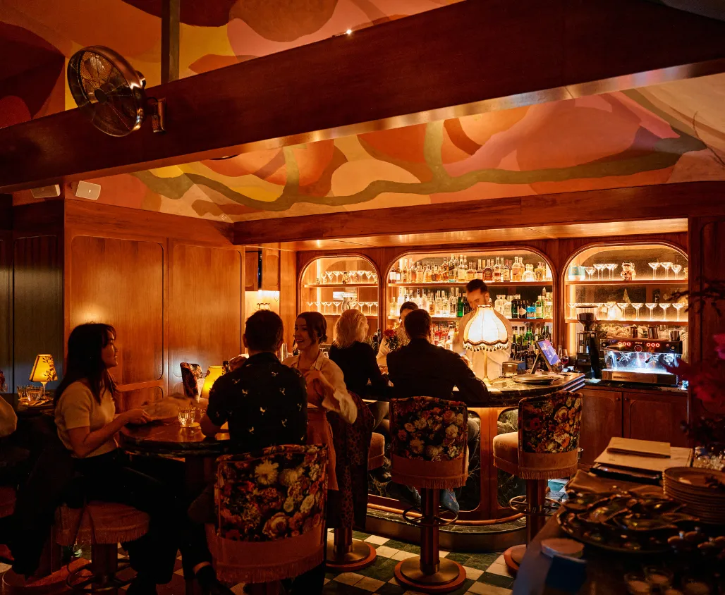 Warmly lit Martini bar.