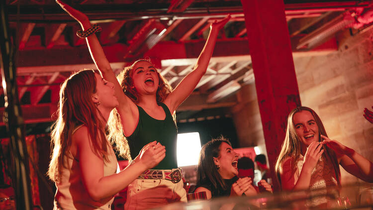 People cheering at a show
