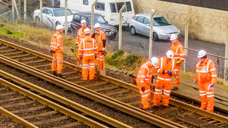 Maintenance workers on train tracks in the UK