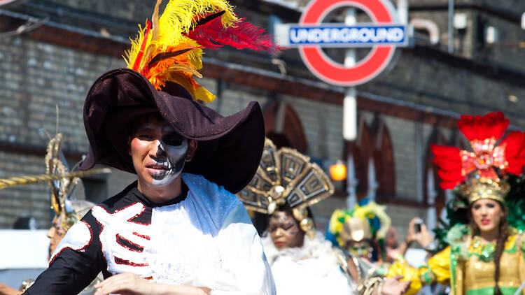 Notting Hill Carnival parade, with London Underground roundel