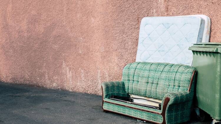 Old sofa and mattress left curbside
