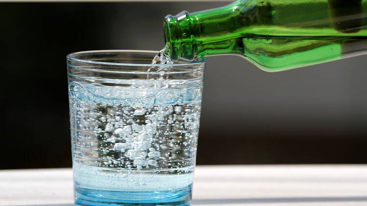 Mineral water being poured into a glass