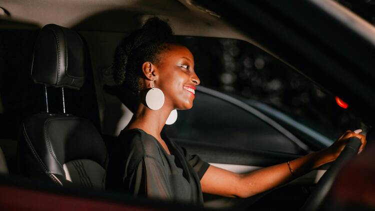 women driving a car