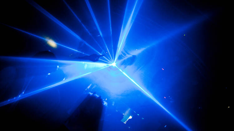 Stock image of a laser in a nightclub