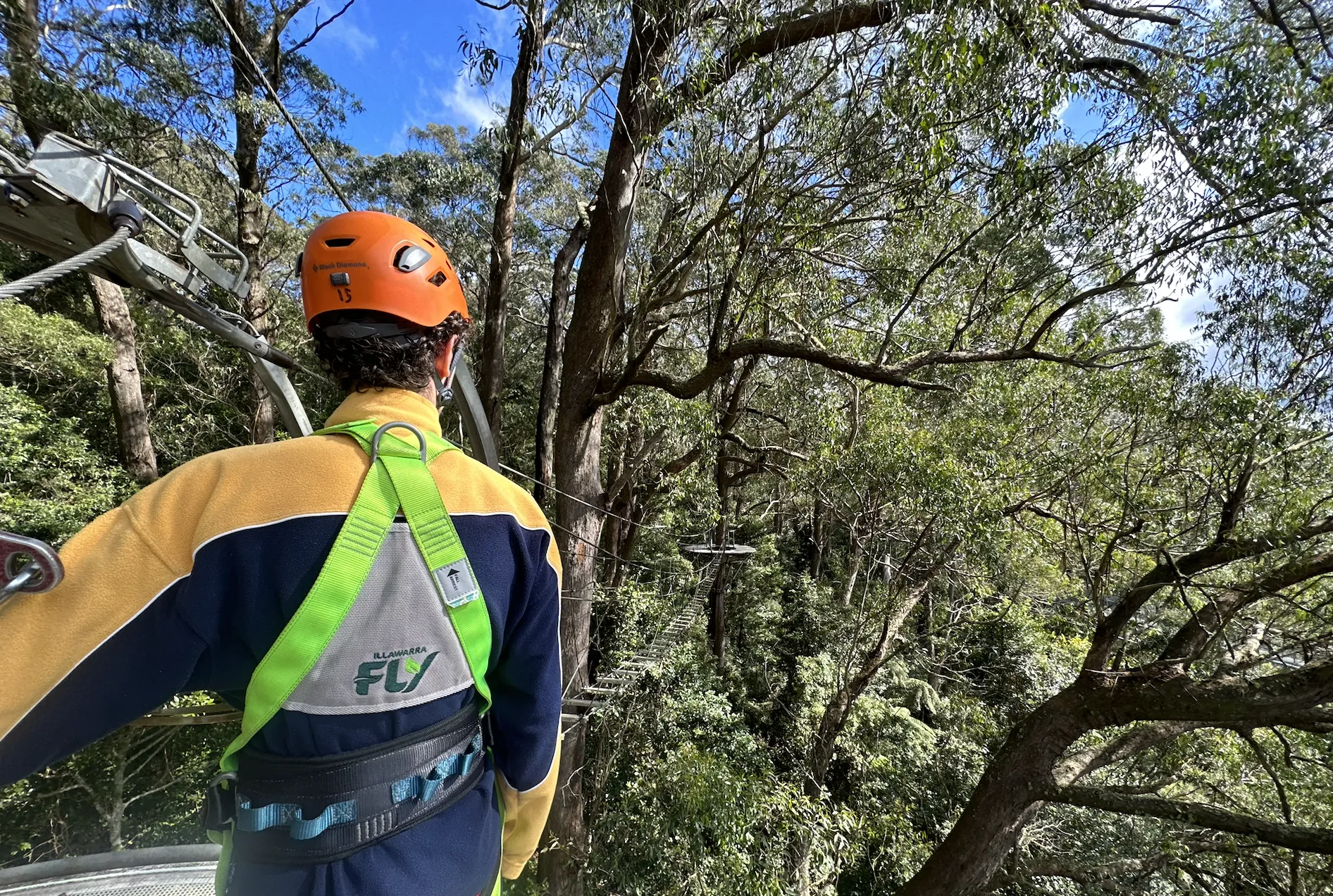 Person standing on a ropes course