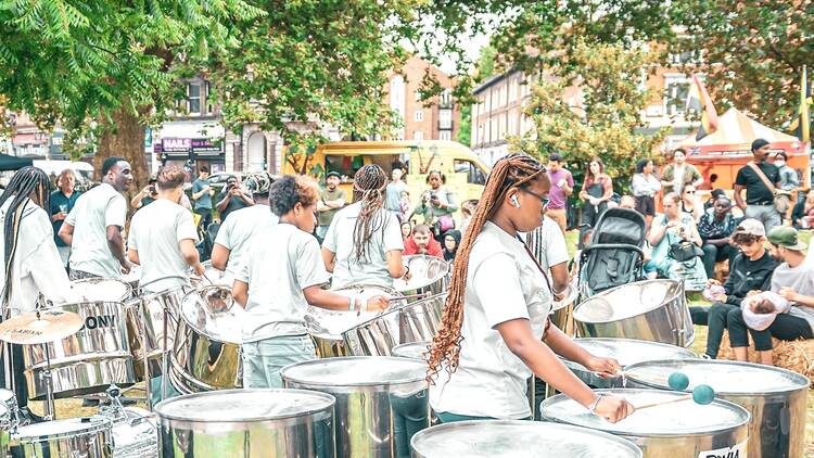 Ebony Steel Band drummers playing at Camberwell Carnival