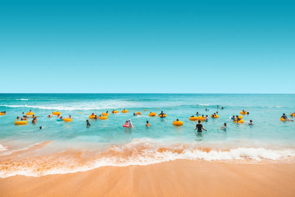 People swimming in the sea on Jeju Island