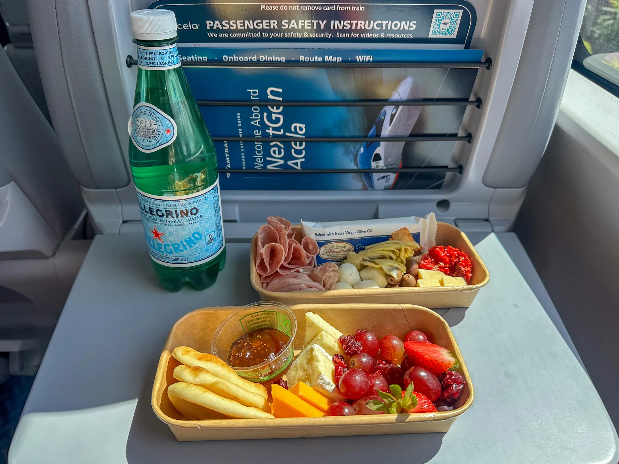 Cheese plate, antipasto and San Pellegrino on Amtrak NextGen Acela