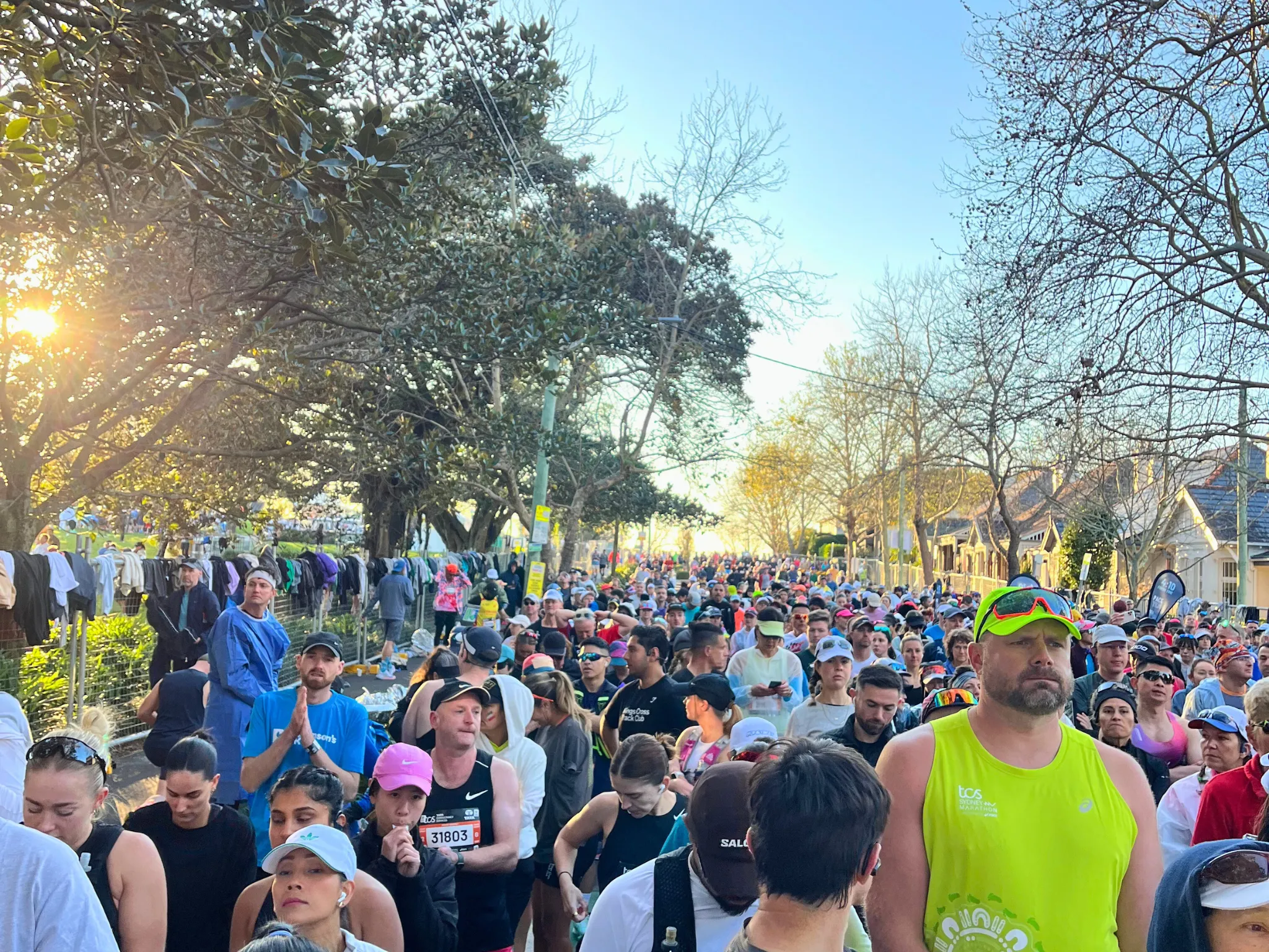 Runners lined up on street