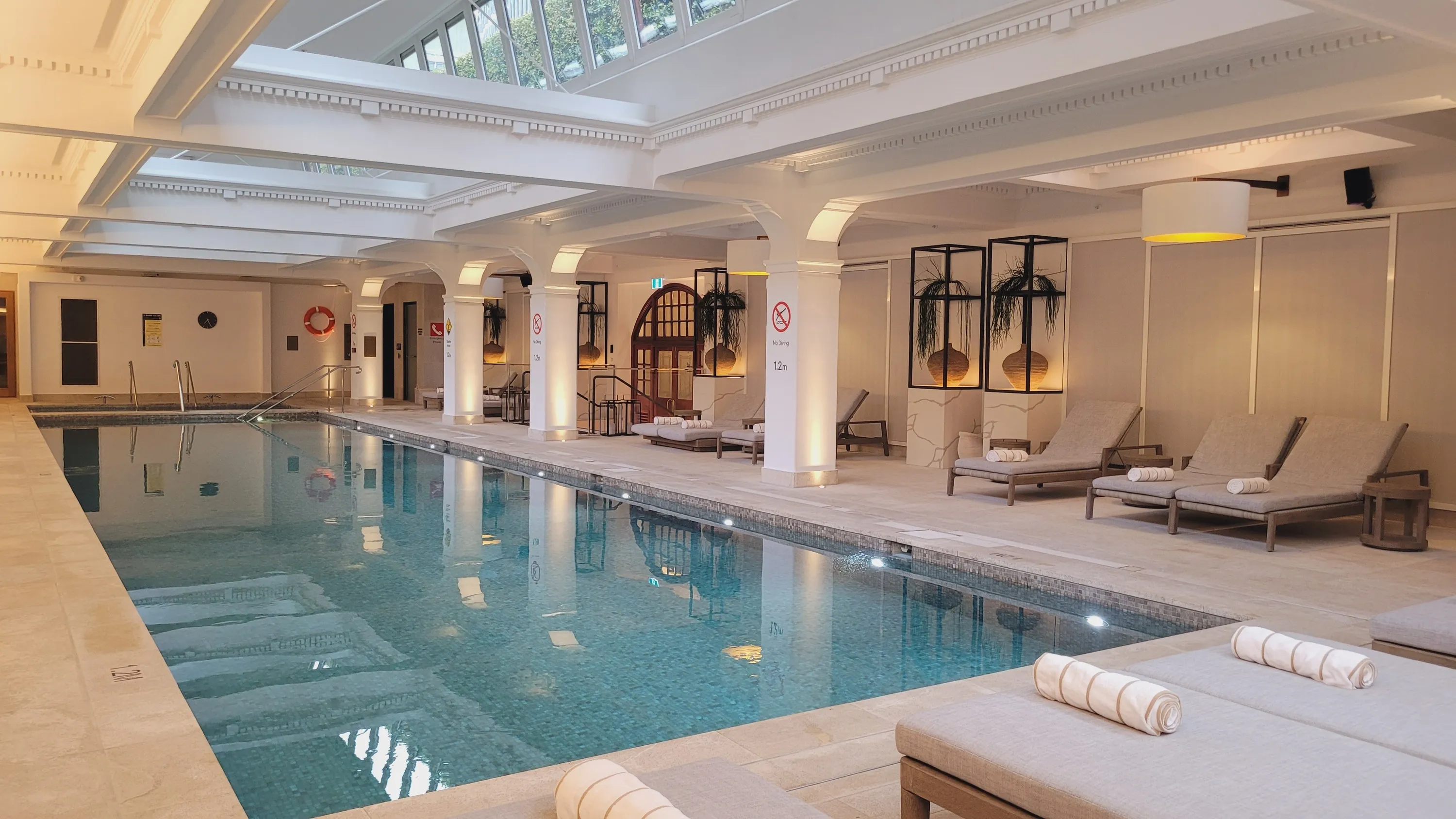 A long pool in a hotel