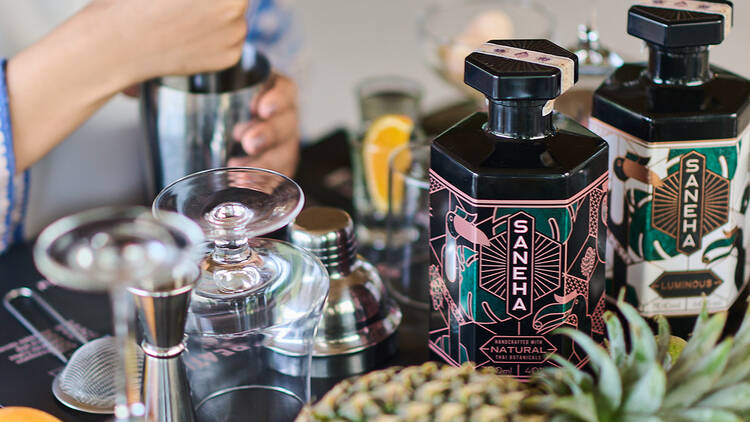 Mix cocktails at The Distillery