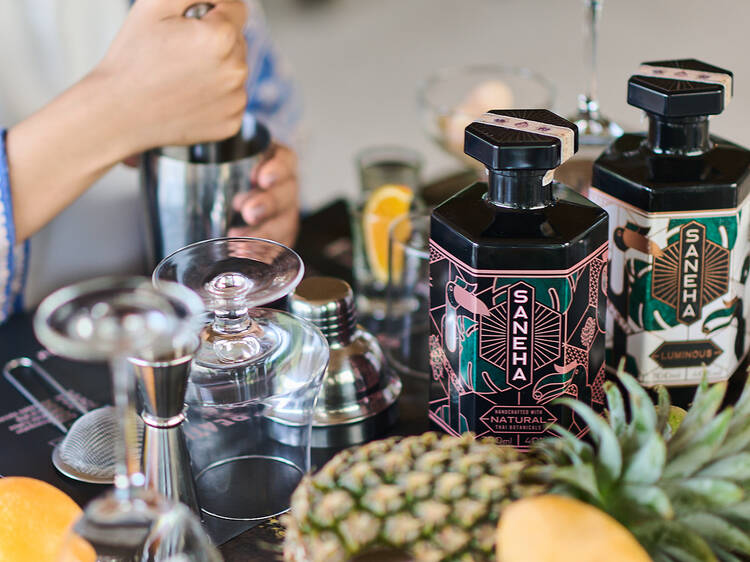 Mix cocktails at The Distillery