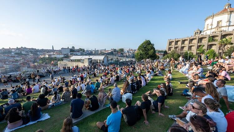 People enjoying the view of Porto from Jardim do Morro