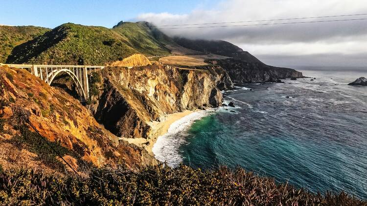 A scenic view of a bridge over a body of water
